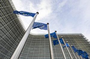 Flags of the European Union in front of the European Commission building in Brussels, Belgium