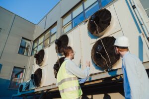 service-engineers-in-uniform-inspecting-industrial-2025-02-12-19-50-54-utc